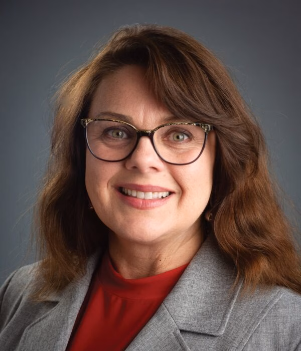 Headshot of Tami Bacon.